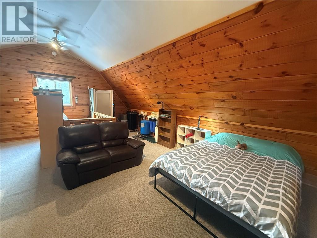 110 Champlain Trail, Westree, ON - Indoor Photo Showing Bedroom