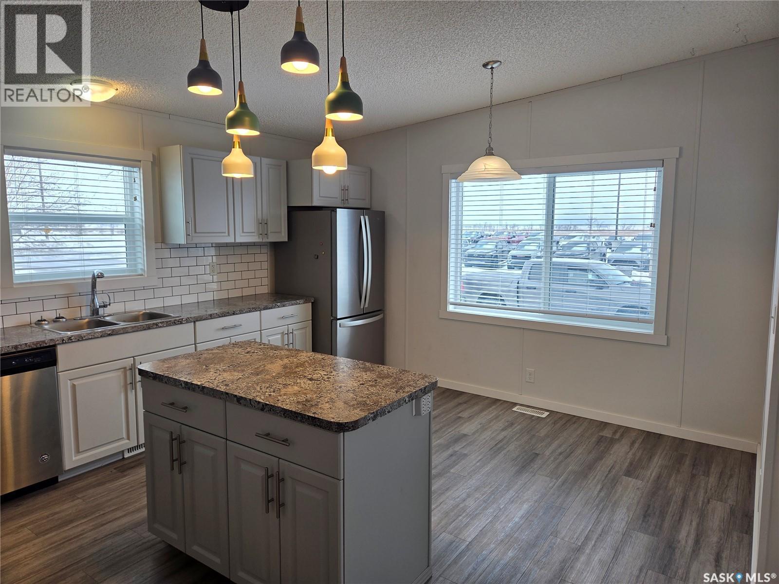 413 Railway Street, Kipling, SK - Indoor Photo Showing Kitchen With Double Sink