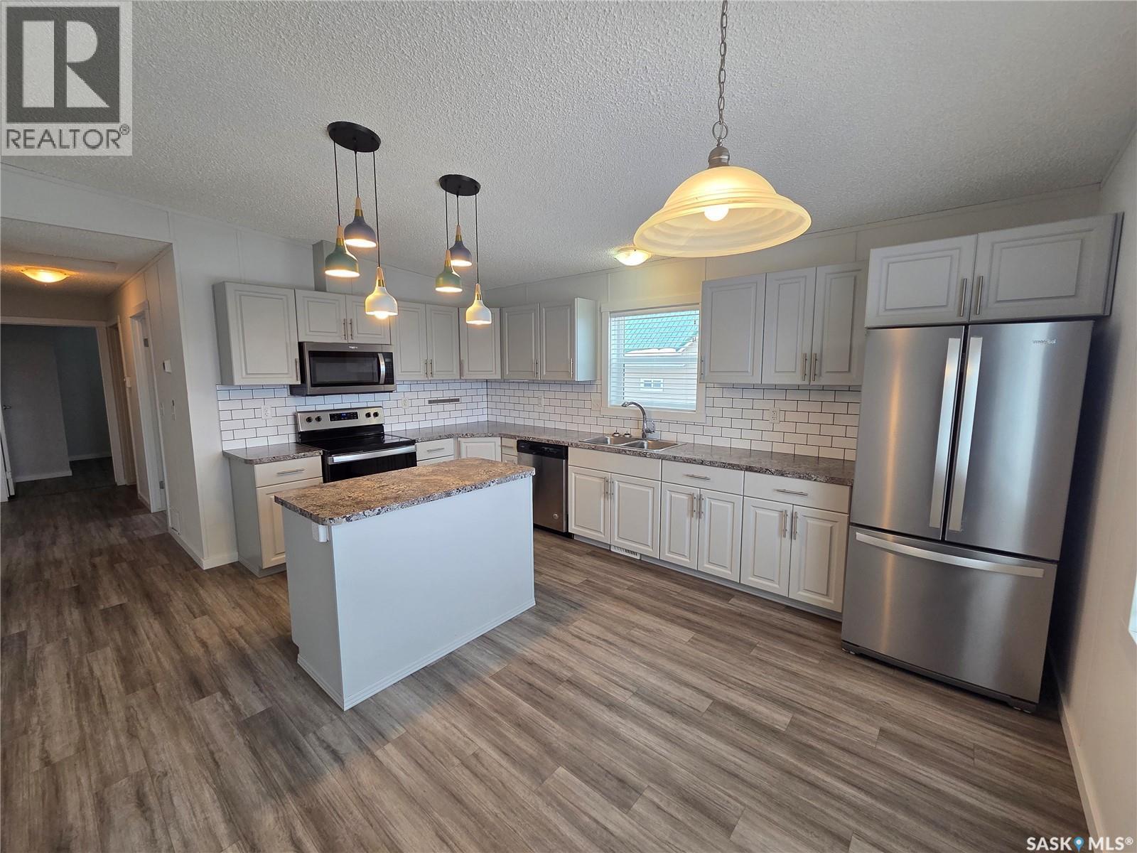 413 Railway Street, Kipling, SK - Indoor Photo Showing Kitchen With Double Sink