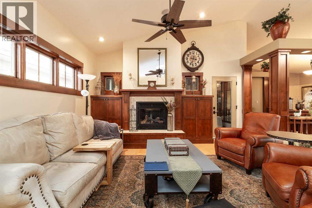 1003 Canyon Boulevard W, Lethbridge, AB - Indoor Photo Showing Living Room With Fireplace