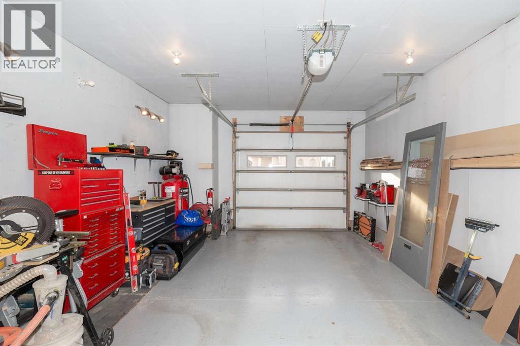 1003 Canyon Boulevard W, Lethbridge, AB - Indoor Photo Showing Garage