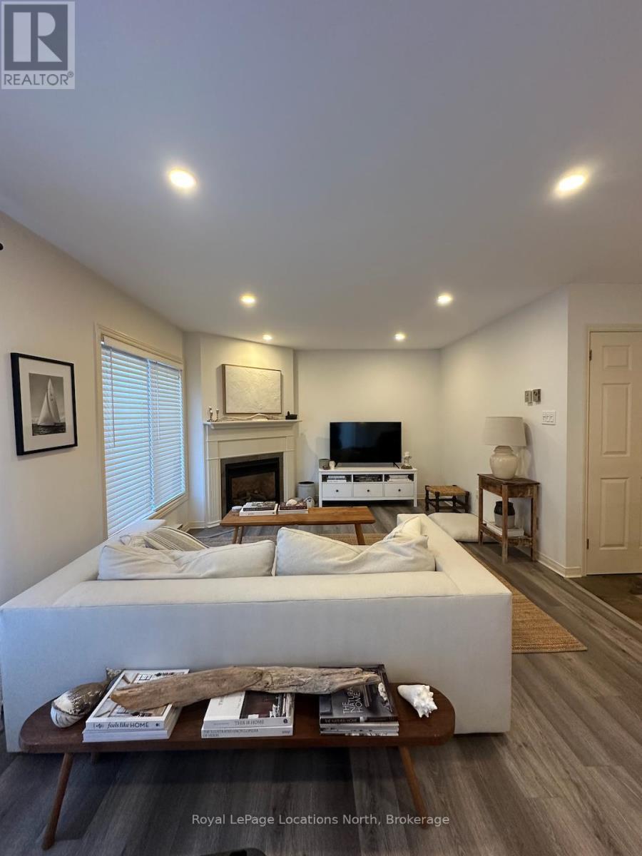 378 Mariners Way, Collingwood, ON - Indoor Photo Showing Other Room With Fireplace