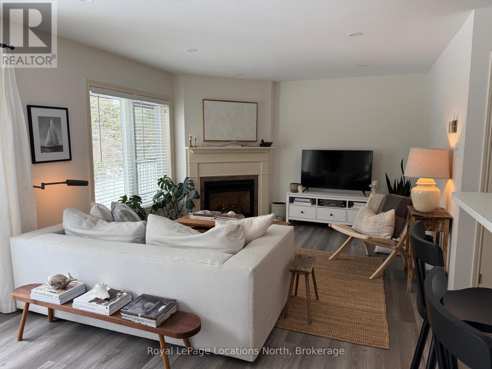 378 Mariners Way, Collingwood, ON - Indoor Photo Showing Living Room With Fireplace