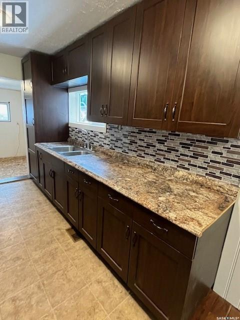 112 Main Street, Harris, SK - Indoor Photo Showing Kitchen With Double Sink