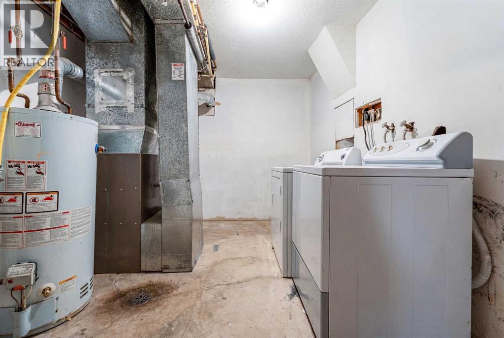 350 33 Avenue Ne, Calgary, AB - Indoor Photo Showing Laundry Room