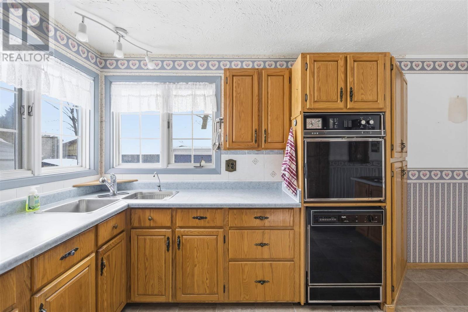 9 Buchan Ave, Blind River, ON - Indoor Photo Showing Kitchen With Double Sink