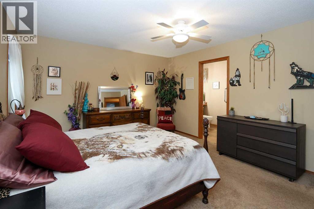 31 Armitage Close, Red Deer, AB - Indoor Photo Showing Bedroom