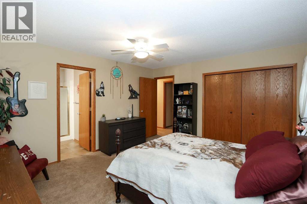 31 Armitage Close, Red Deer, AB - Indoor Photo Showing Bedroom