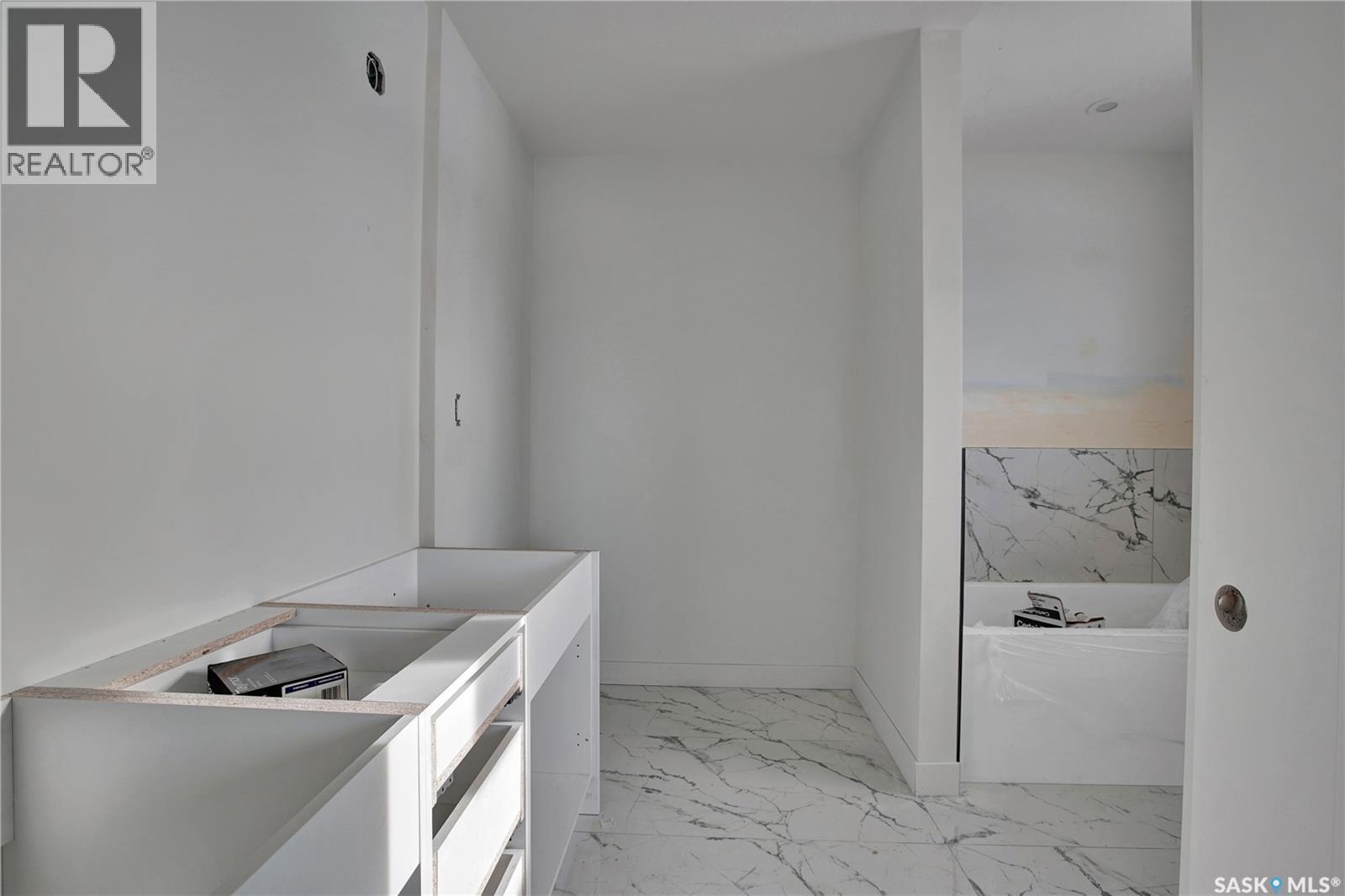 722 Casper Crescent, Warman, SK - Indoor Photo Showing Laundry Room