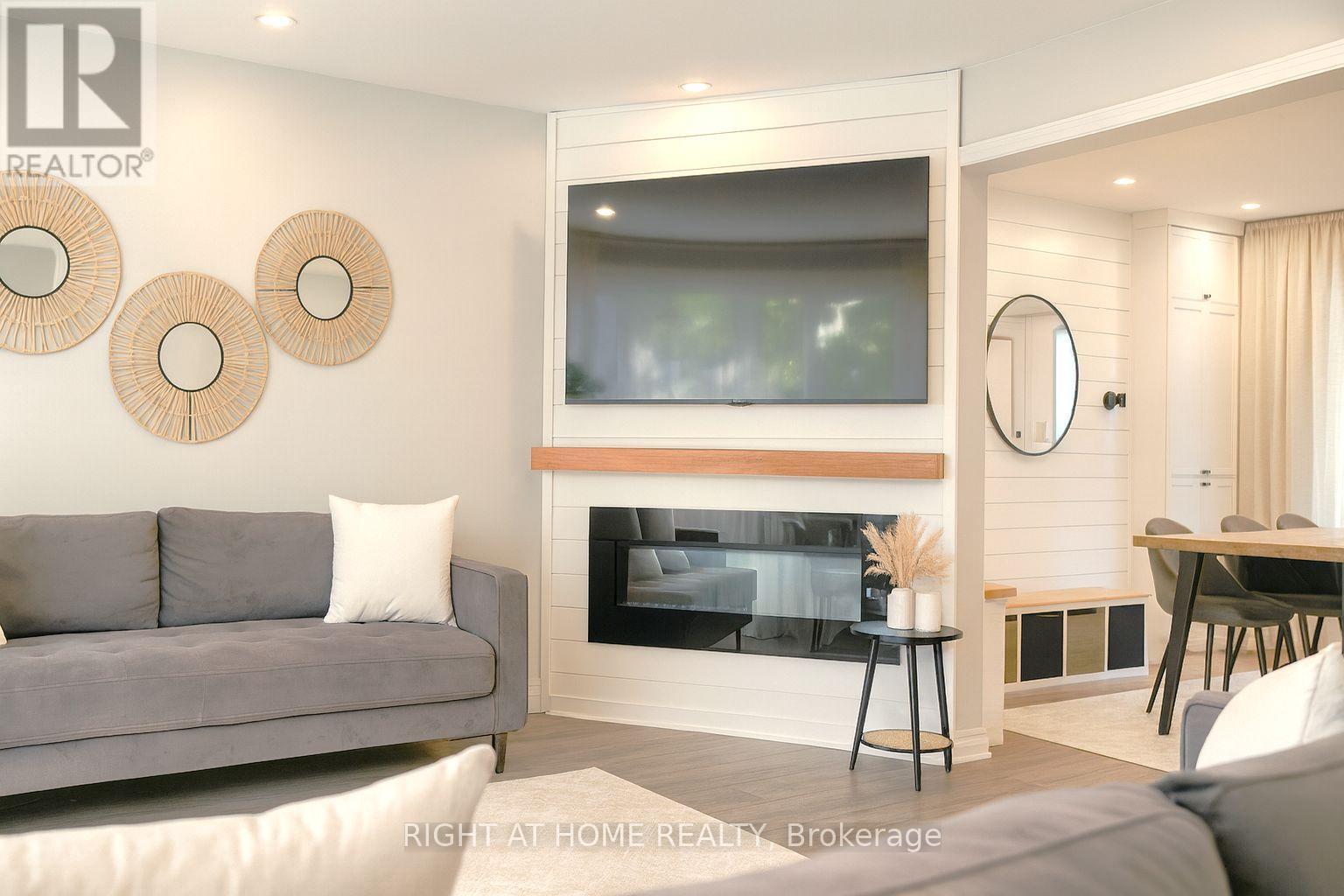 347 Zephyr Avenue, Ottawa, ON - Indoor Photo Showing Living Room With Fireplace