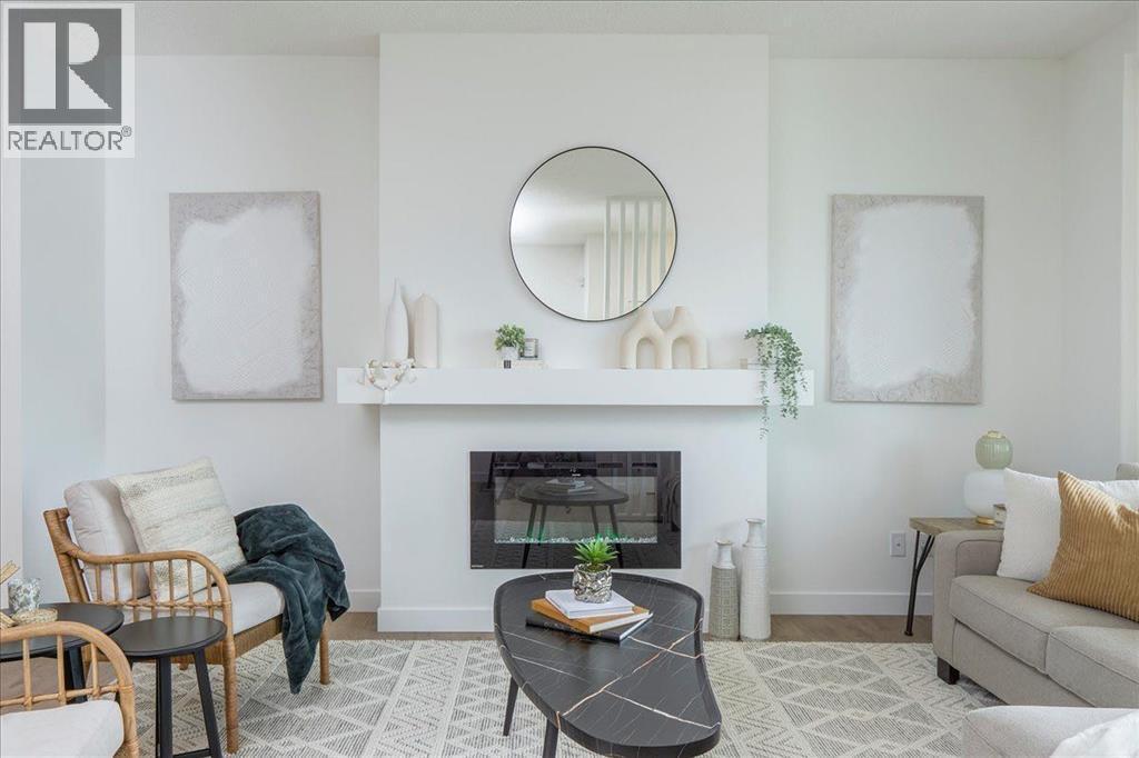 540 Legacy Circle Se, Calgary, AB - Indoor Photo Showing Living Room With Fireplace