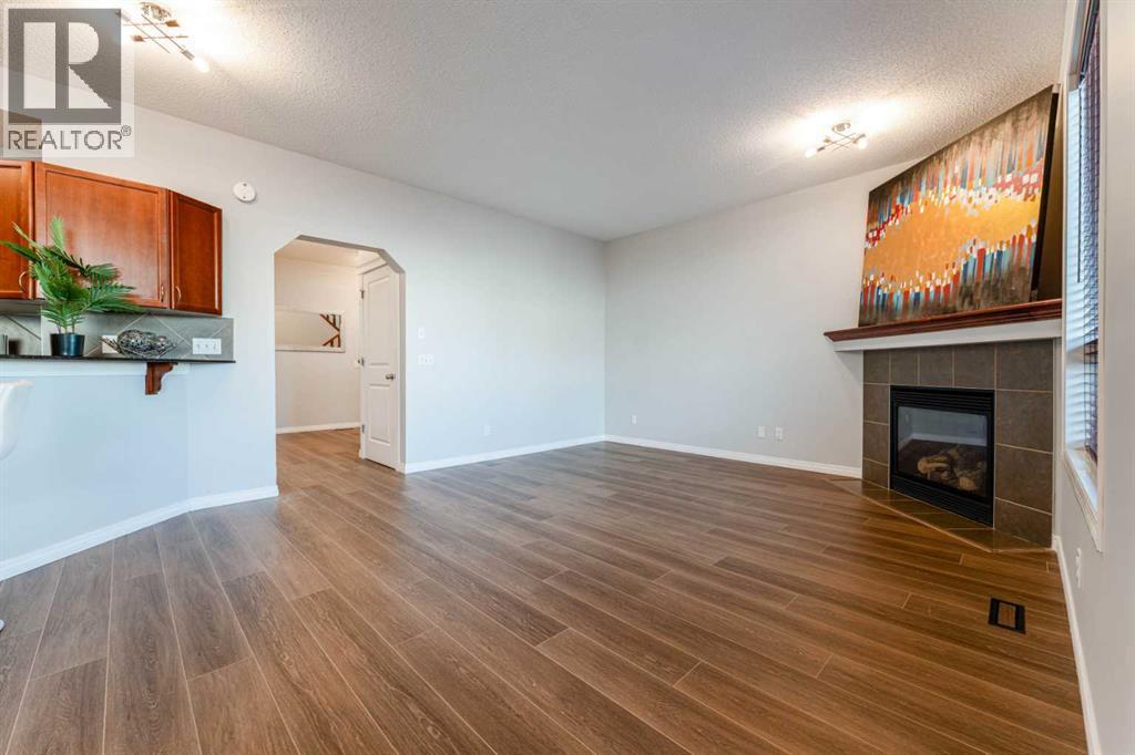 10 Everglen Crescent Sw, Calgary, AB - Indoor With Fireplace