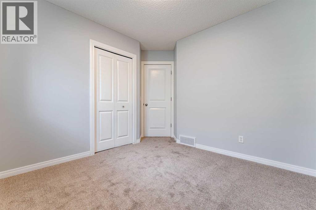 10 Everglen Crescent Sw, Calgary, AB - Indoor Photo Showing Other Room