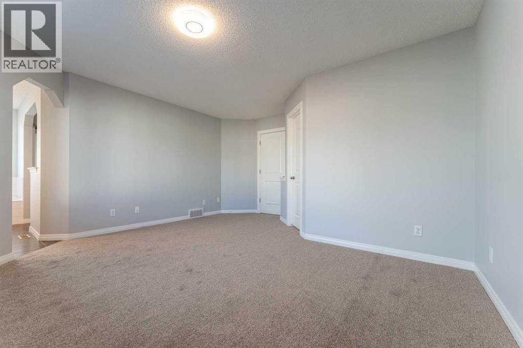 10 Everglen Crescent Sw, Calgary, AB - Indoor Photo Showing Other Room