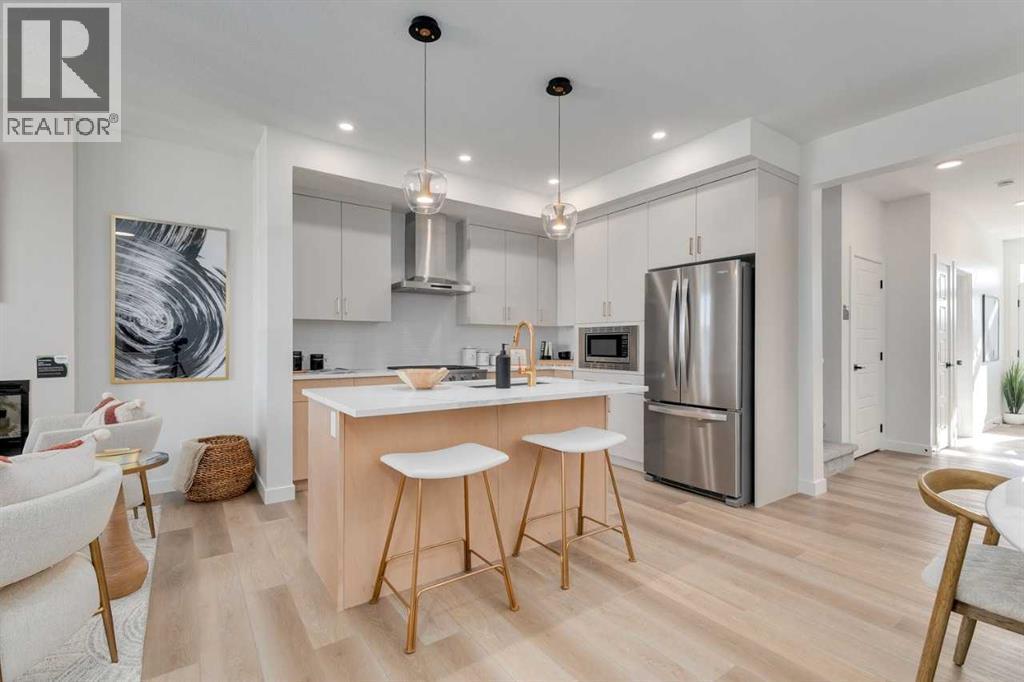 240 Layton Link Se, Airdrie, AB - Indoor Photo Showing Kitchen With Upgraded Kitchen