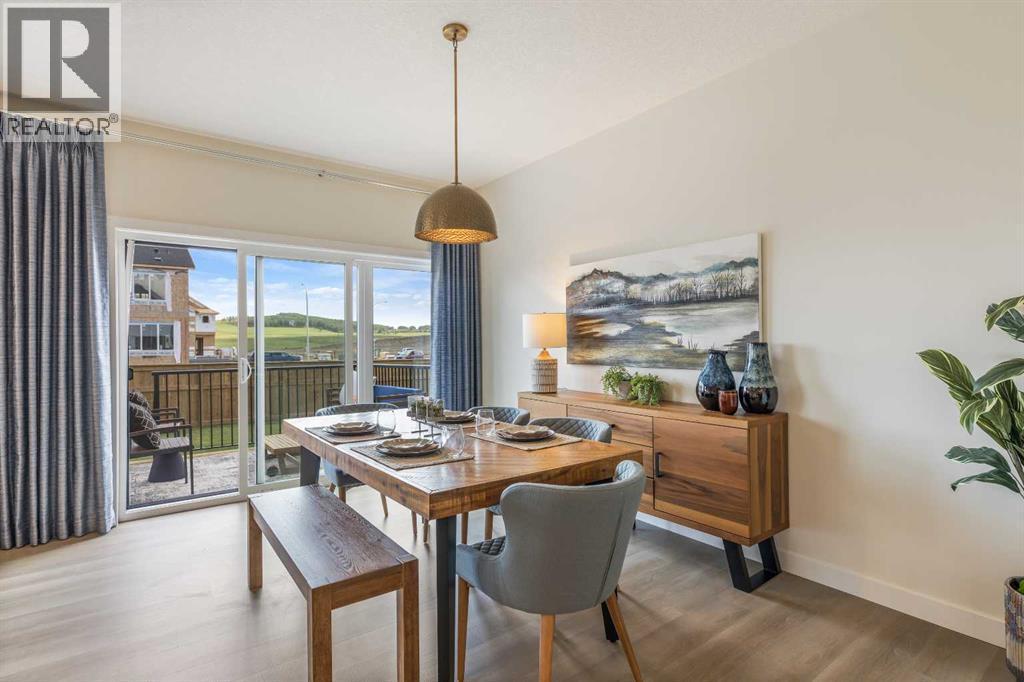 65 Emberside Grove, Cochrane, AB - Indoor Photo Showing Dining Room