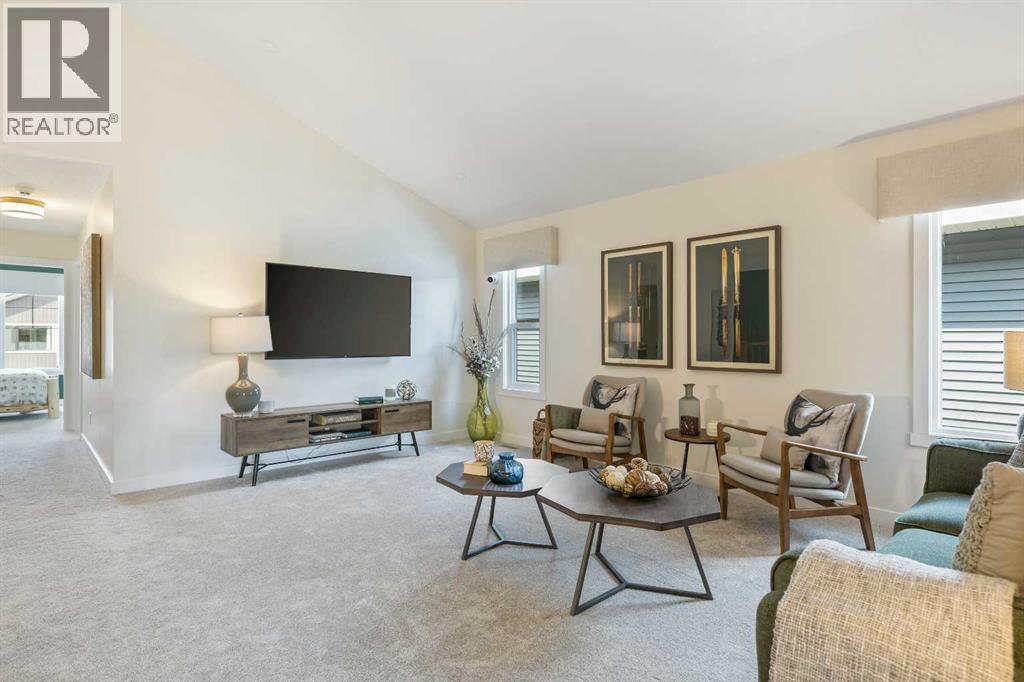 65 Emberside Grove, Cochrane, AB - Indoor Photo Showing Living Room