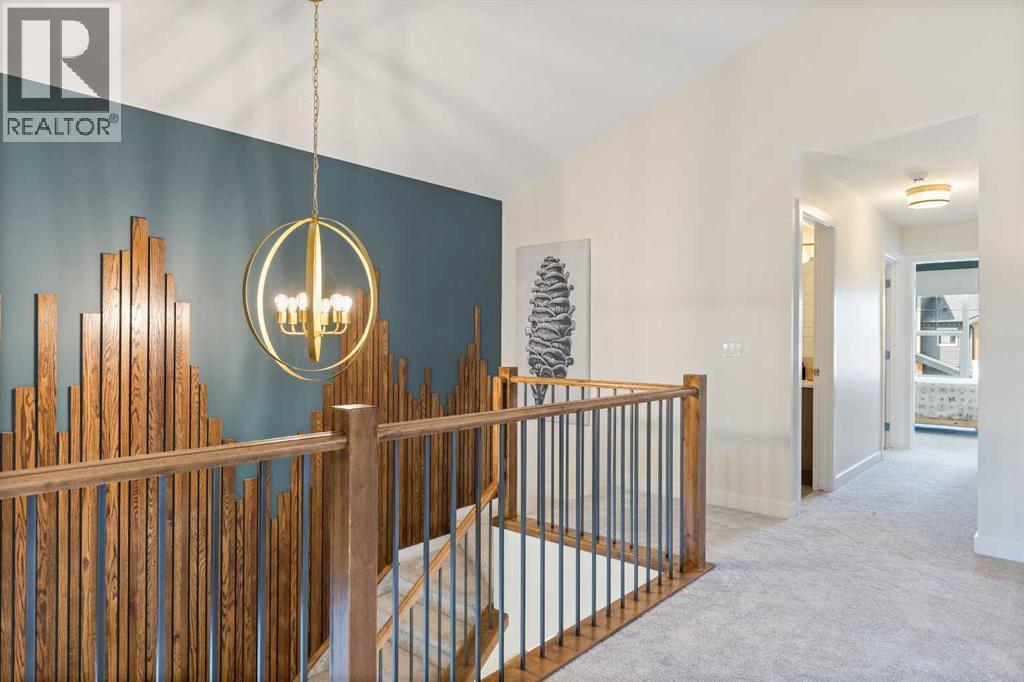 65 Emberside Grove, Cochrane, AB - Indoor Photo Showing Other Room