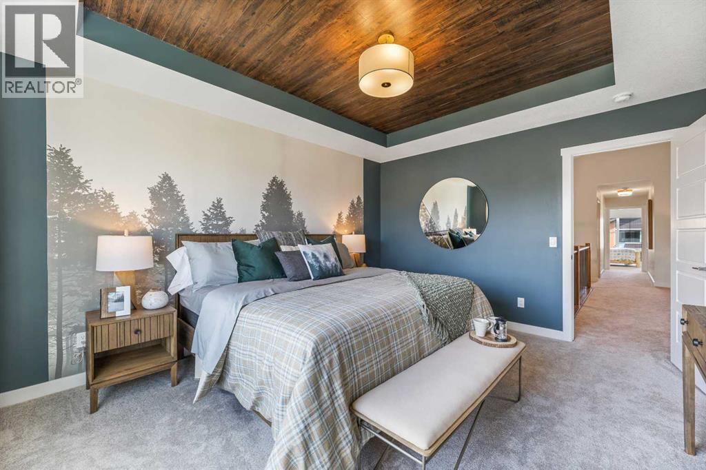 65 Emberside Grove, Cochrane, AB - Indoor Photo Showing Bedroom