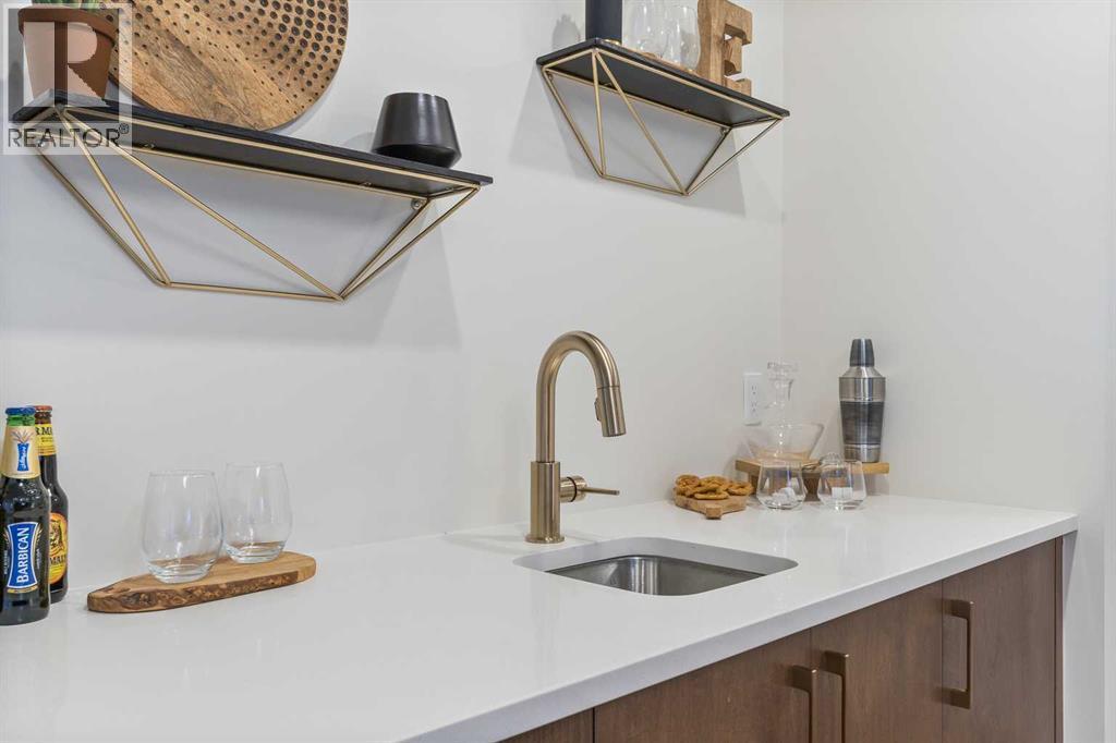 65 Emberside Grove, Cochrane, AB - Indoor Photo Showing Kitchen