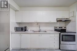 Kitchen with ample storage cupboards -