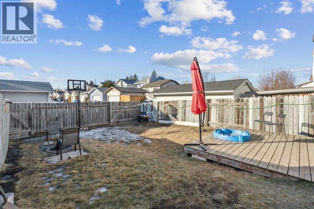65 Tararidge Close Ne, Calgary, AB - Outdoor With Deck Patio Veranda