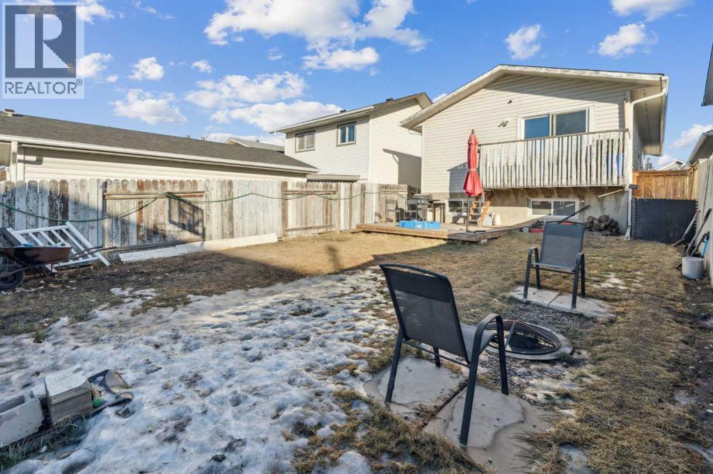 65 Tararidge Close Ne, Calgary, AB - Outdoor With Deck Patio Veranda
