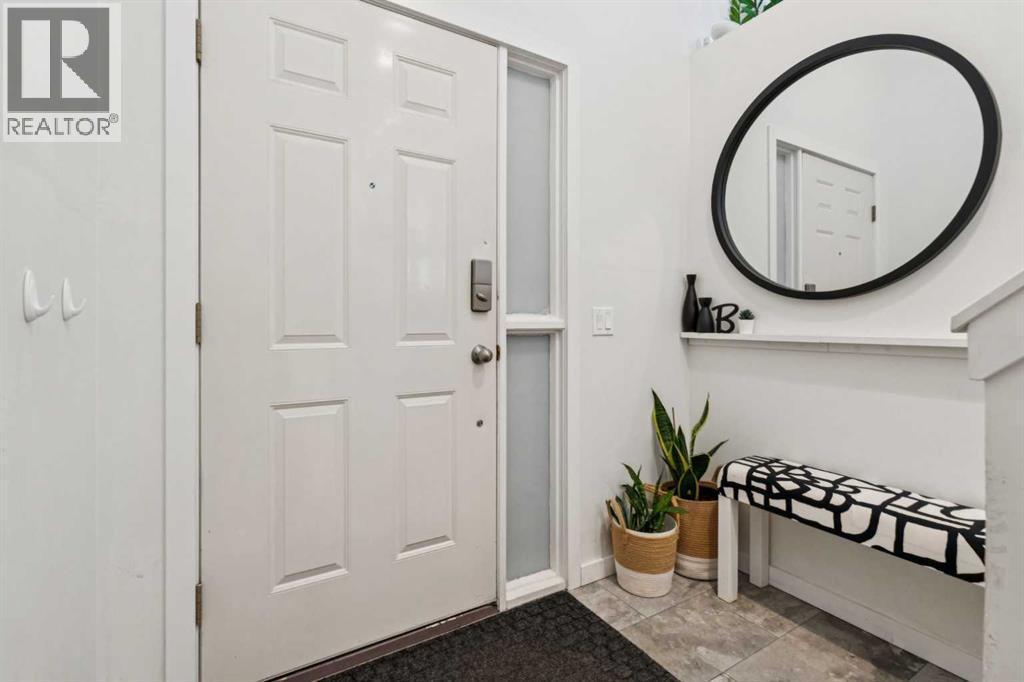 65 Tararidge Close Ne, Calgary, AB - Indoor Photo Showing Other Room