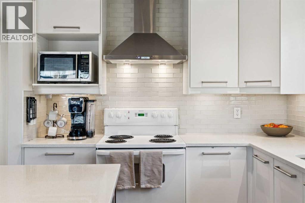 65 Tararidge Close Ne, Calgary, AB - Indoor Photo Showing Kitchen
