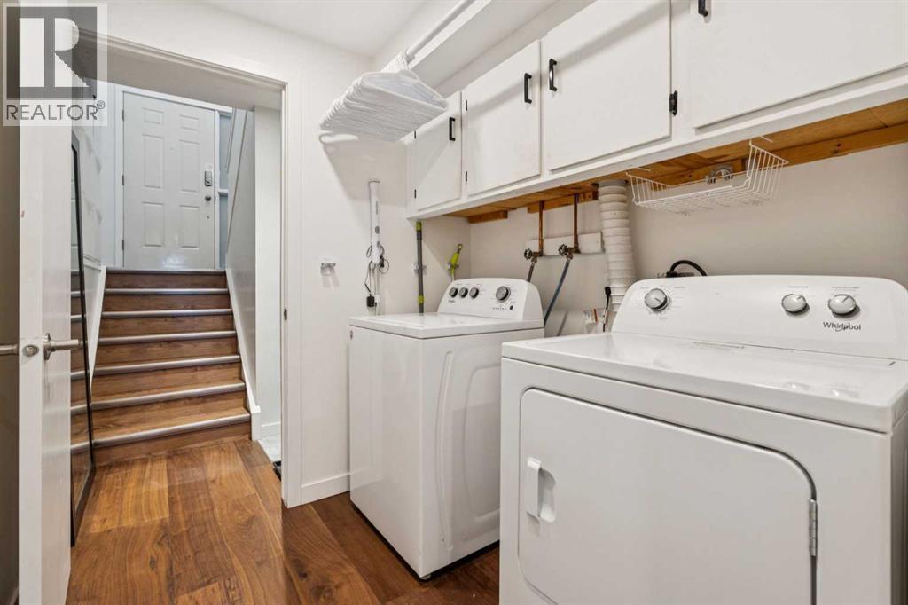 65 Tararidge Close Ne, Calgary, AB - Indoor Photo Showing Laundry Room