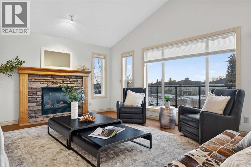 55 Billy Haynes Trail, Okotoks, AB - Indoor Photo Showing Living Room With Fireplace
