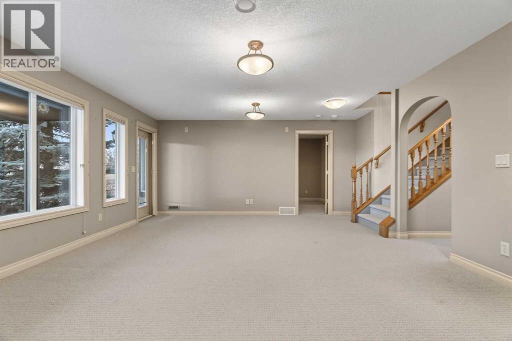 55 Billy Haynes Trail, Okotoks, AB - Indoor Photo Showing Other Room