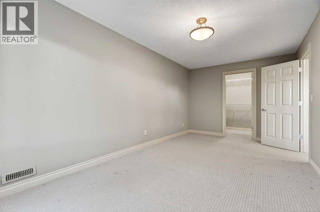 55 Billy Haynes Trail, Okotoks, AB - Indoor Photo Showing Other Room