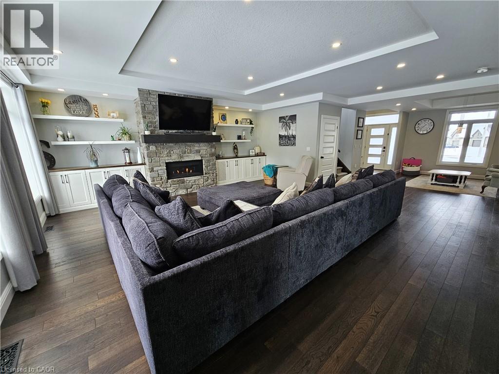 Great Room with Gas Fireplace - 46 Stonebridge Place, Simcoe, ON - Indoor Photo Showing Living Room With Fireplace