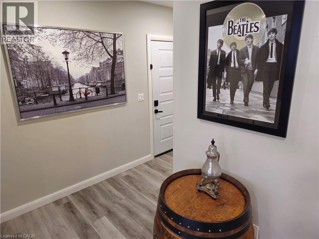 Walk-up to the Triple Car Heated Garage - 46 Stonebridge Place, Simcoe, ON - Indoor Photo Showing Other Room