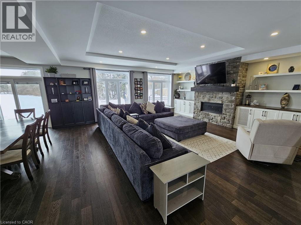 Great Room with Gas Fireplace - 46 Stonebridge Place, Simcoe, ON - Indoor Photo Showing Living Room With Fireplace