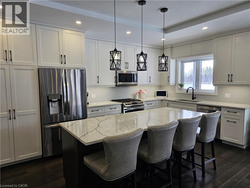 4 Seater Island with Quartz Countertops - 46 Stonebridge Place, Simcoe, ON - Indoor Photo Showing Other Room