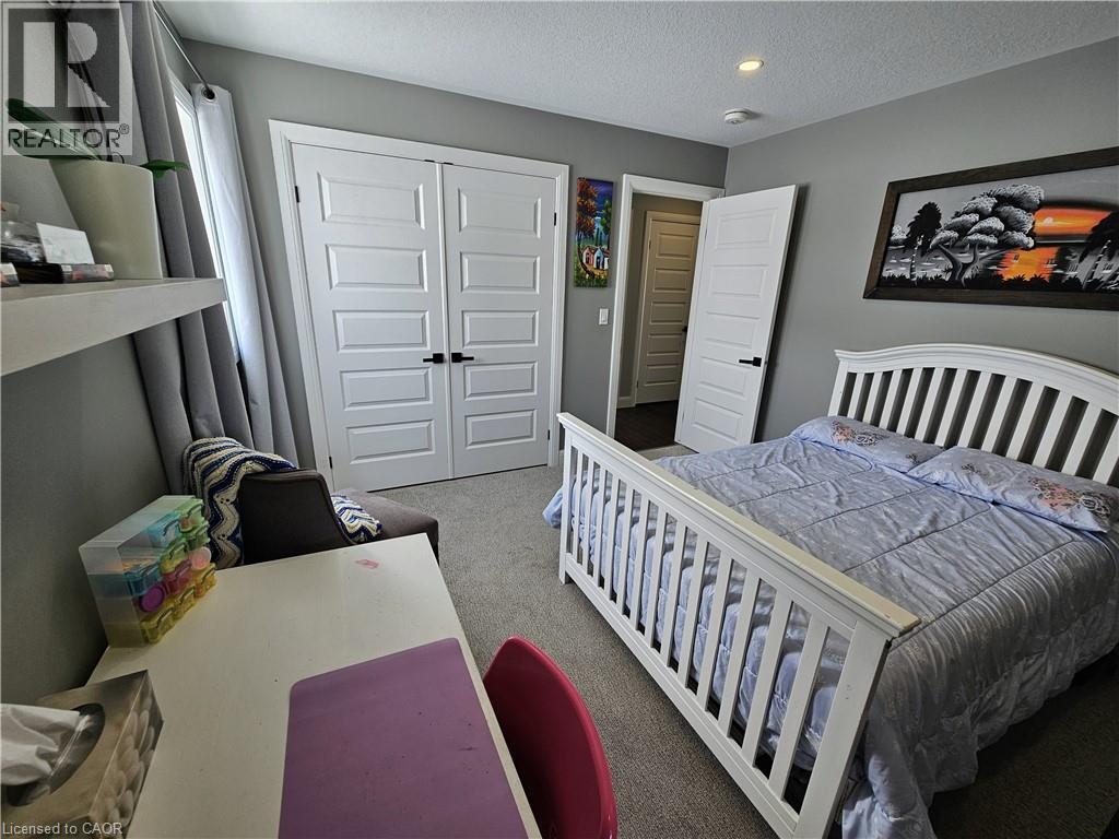 Fourth Bedroom with potential walk-in closet or office - 46 Stonebridge Place, Simcoe, ON - Indoor Photo Showing Bedroom