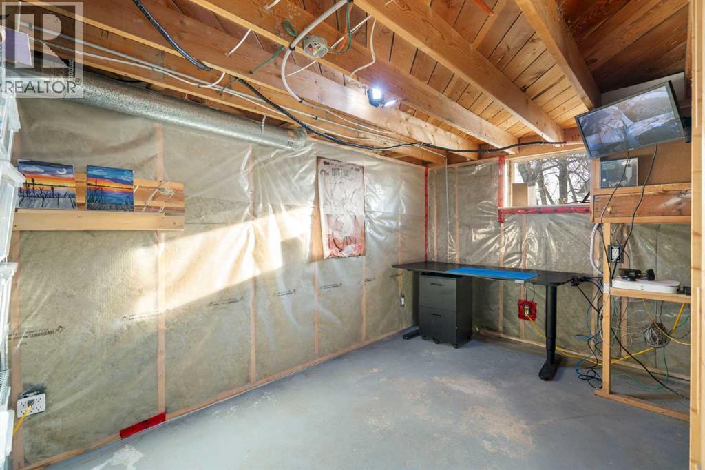 111 Macleod Trail E, Rural Foothills County, AB - Indoor Photo Showing Basement