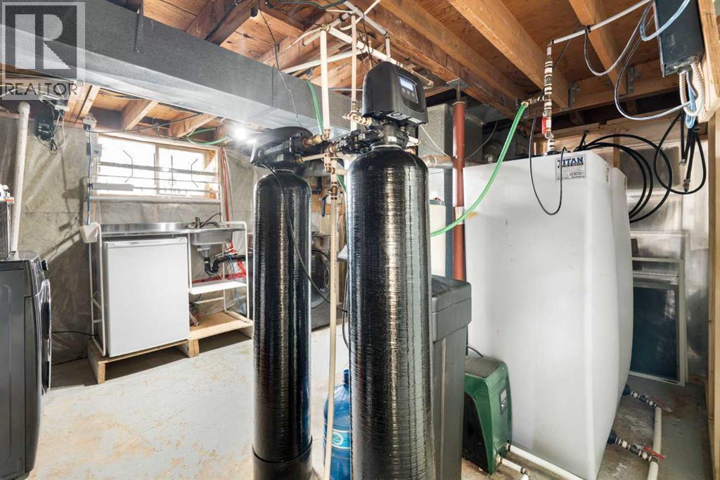 111 Macleod Trail E, Rural Foothills County, AB - Indoor Photo Showing Basement
