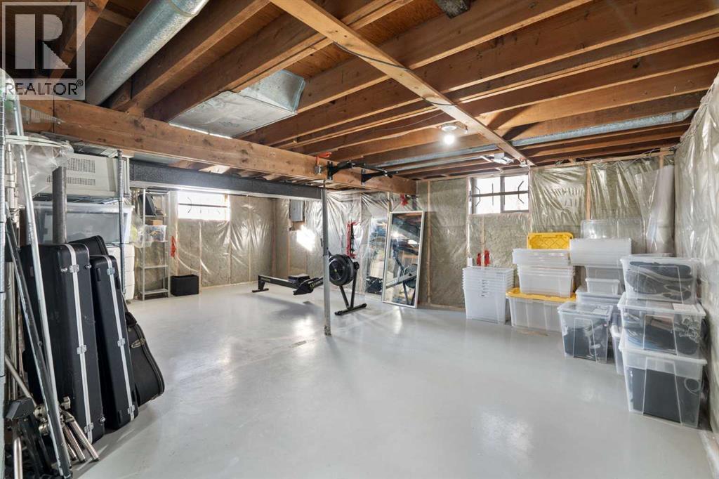 111 Macleod Trail E, Rural Foothills County, AB - Indoor Photo Showing Basement