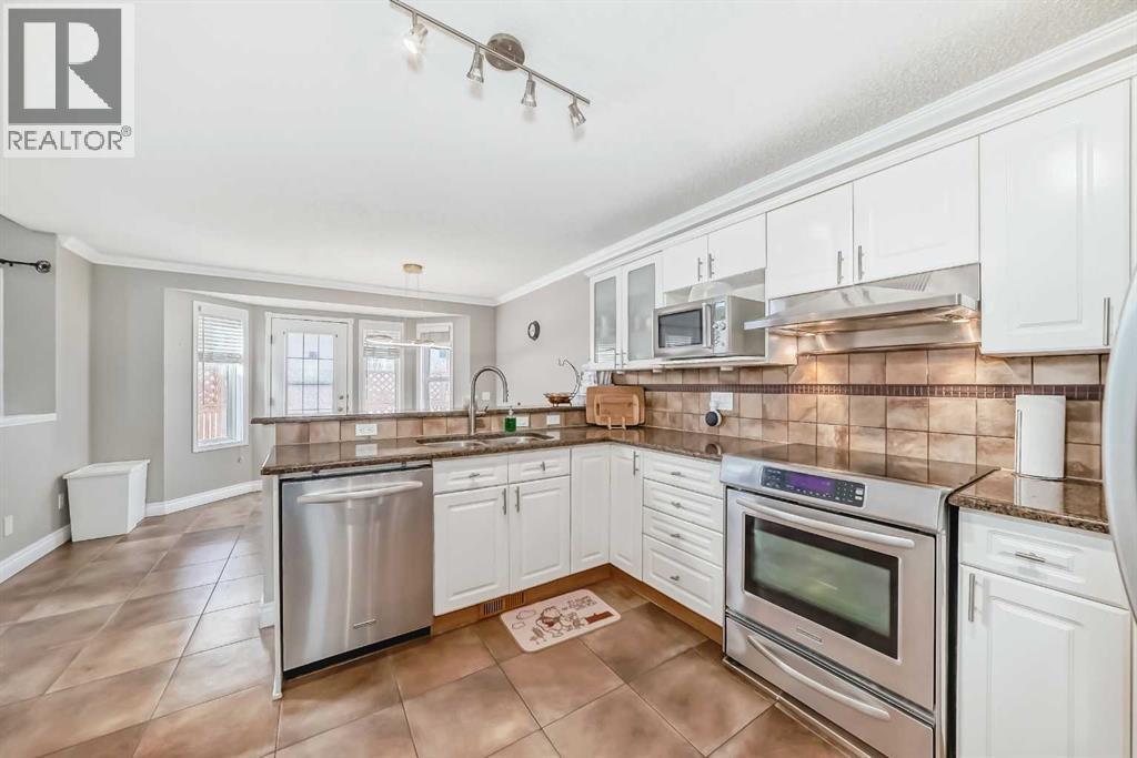 All stainless steel appliance - 188 Hidden Ranch Crescent Nw, Calgary, AB - Indoor Photo Showing Kitchen