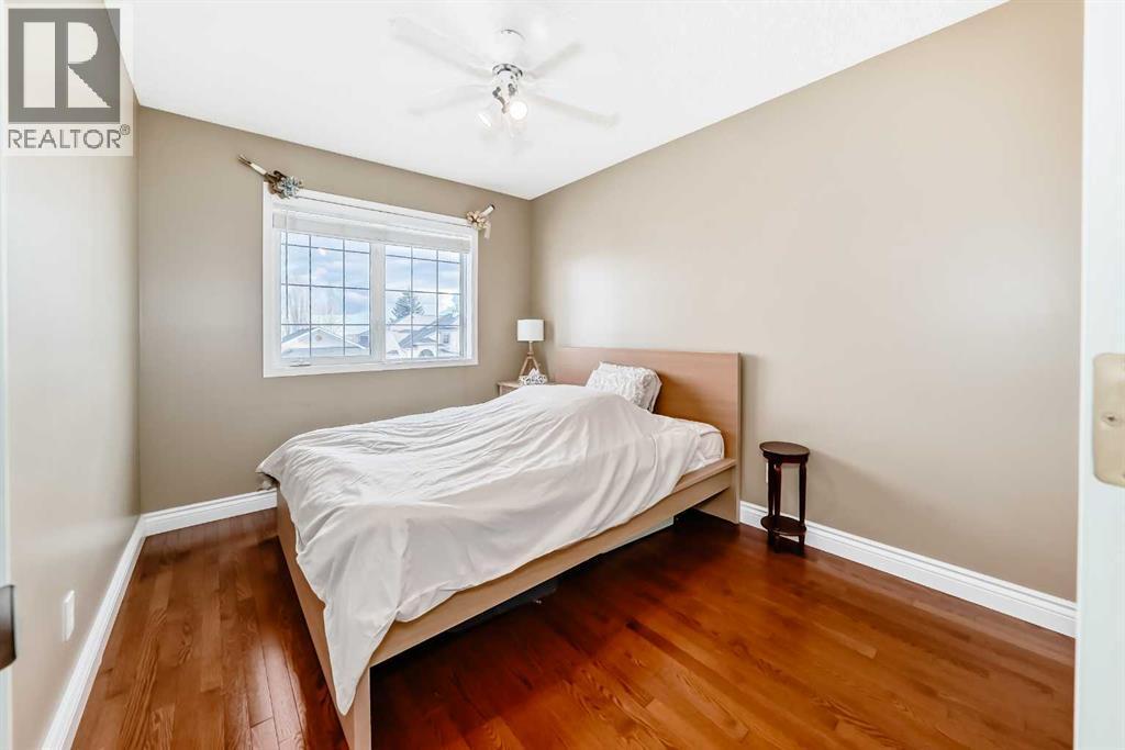 Bedroom 3 - 188 Hidden Ranch Crescent Nw, Calgary, AB - Indoor Photo Showing Bedroom