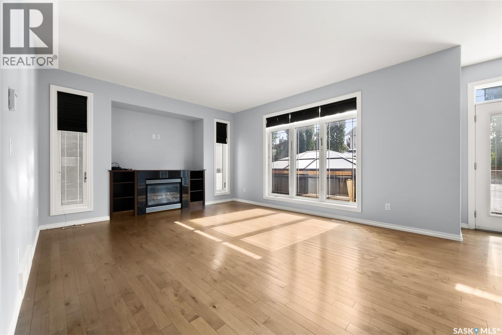 6925 Maple Ridge Drive, Regina, SK - Indoor Photo Showing Living Room With Fireplace