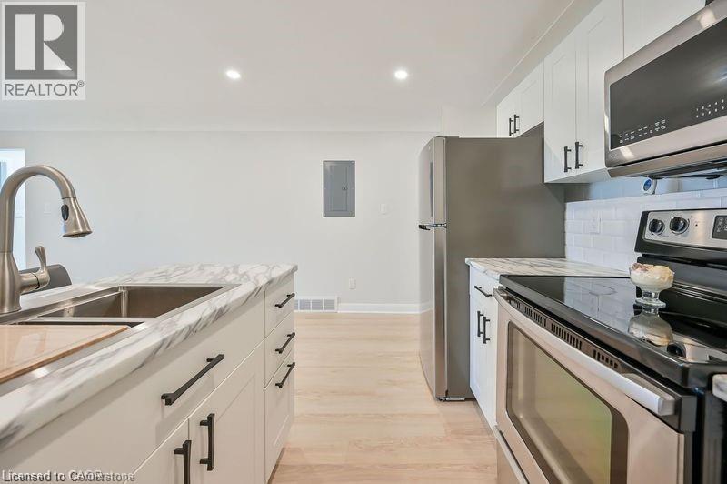 738 Mohawk Road E Unit# Upper Unit, Hamilton, ON - Indoor Photo Showing Kitchen With Stainless Steel Kitchen With Double Sink