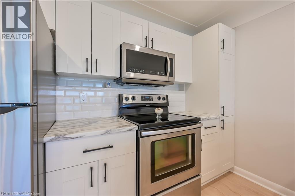 738 Mohawk Road E Unit# Upper Unit, Hamilton, ON - Indoor Photo Showing Kitchen With Stainless Steel Kitchen