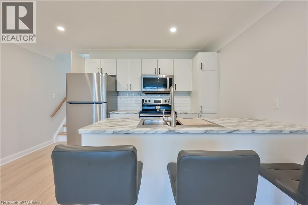 738 Mohawk Road E Unit# Upper Unit, Hamilton, ON - Indoor Photo Showing Kitchen With Stainless Steel Kitchen With Double Sink
