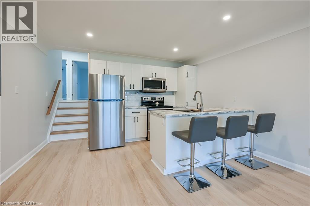 738 Mohawk Road E Unit# Upper Unit, Hamilton, ON - Indoor Photo Showing Kitchen With Stainless Steel Kitchen