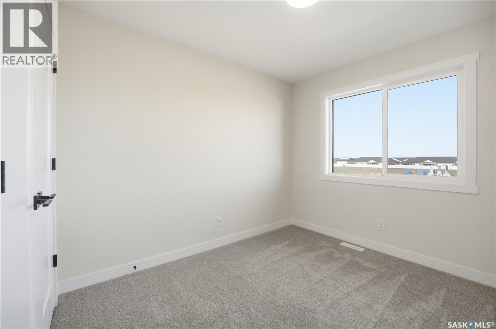 46 Taskamanwa Terrace, Saskatoon, SK - Indoor Photo Showing Other Room