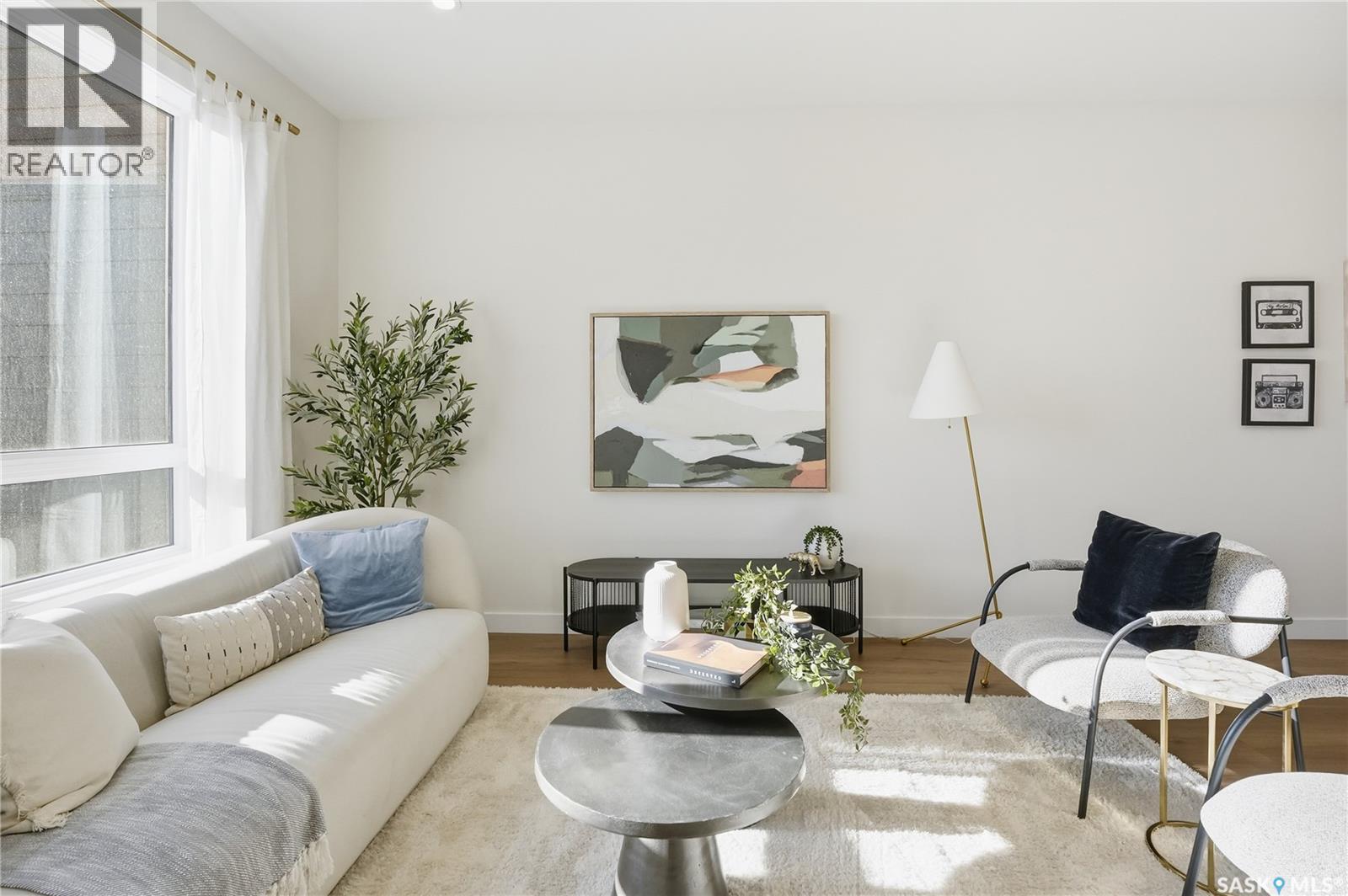 34 Taskamanwa Terrace, Saskatoon, SK - Indoor Photo Showing Living Room